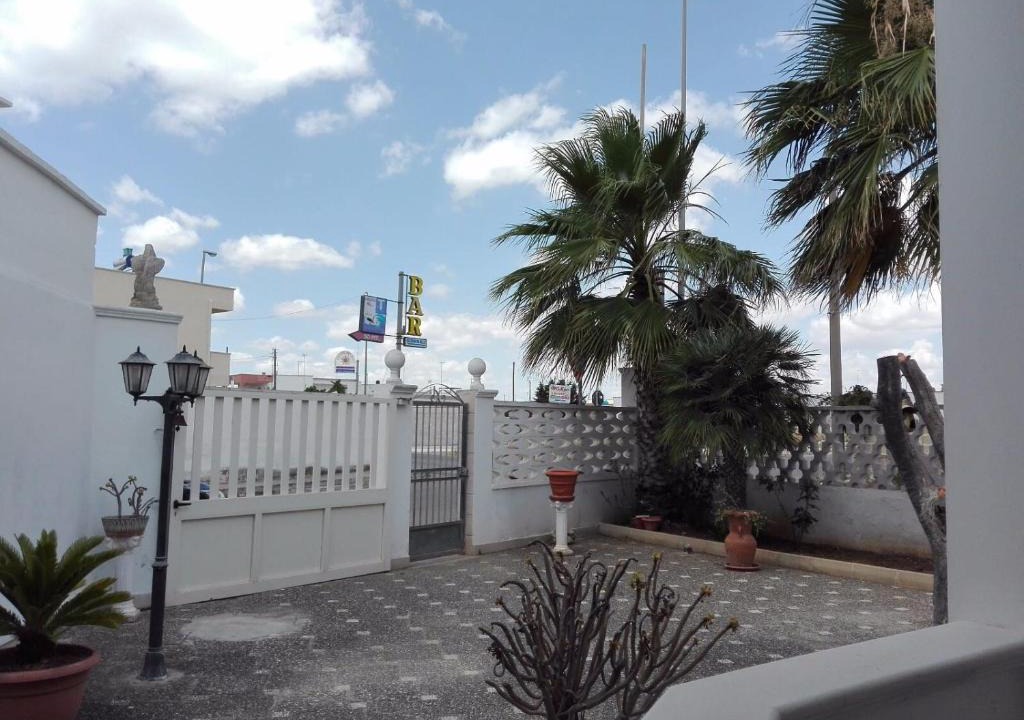 Torre Lapillo House | Legno di mare