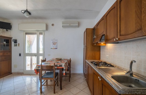 Maruggio Apartment | Apartment 'Marubium - Commenda' with Shared Pool, Wi-Fi and Air Conditioning