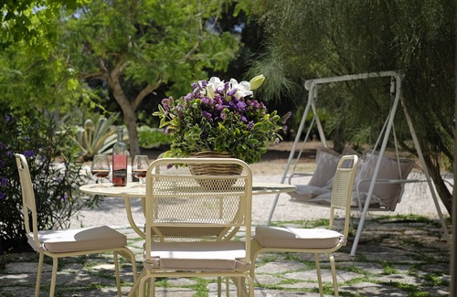 San Vito dei Normanni House | Masseria Ortensia. Garden with swing, hammock, deck chairs. Near the beaches.