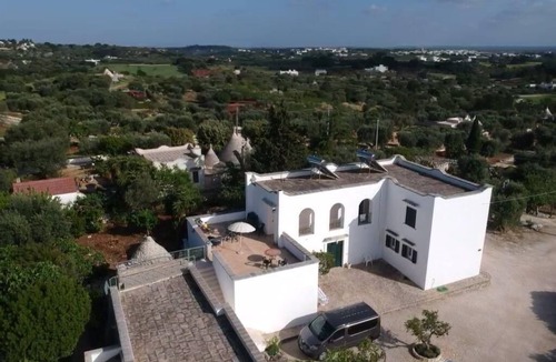 Cisternino Apartment | 4 person, 1st floor appt. Shared, wonderful 9 m. terrace, pool and tennis crt.
