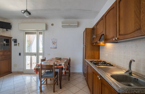 Maruggio Apartment | Apartment 'Marubium - Commenda' with Shared Pool, Wi-Fi and Air Conditioning