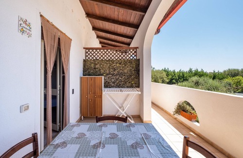 Maruggio Apartment | Apartment 'Marubium - Commenda' with Shared Pool, Wi-Fi and Air Conditioning