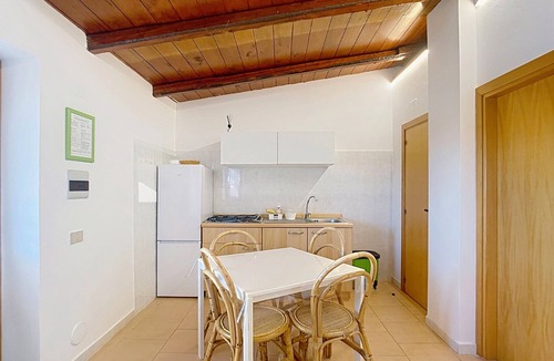 Montincello Apartment | Apartment 'La Mignola - Bilo 2 - Duplicate' with Shared Garden, Wi-Fi and Air Conditioning