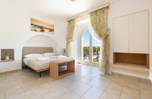Pittuini House | B&B I Tarocchi - Suite La Forza