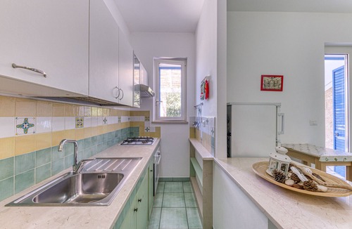 Marina di Novaglie Apartment | Holiday Home 'Il Carrubo Orchide' with Private Terrace, Private Garden and Balcony
