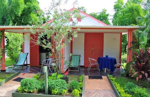 Foulpointe Apartment | Homerez - Studio for 2 ppl. with sea view, garden and terrace at Foulpointe
