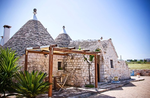 Martina Franca House | Il Ciliegeto: 1800s trullo house with views of pool, vineyard and Itria Valley