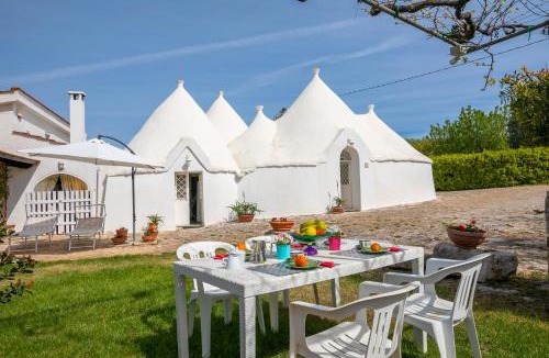 Cozzana House | La Casa Sulla Roccia Trulli Pool - Happy Rentals
