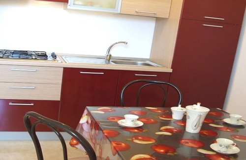 Marina di Ostuni Apartment | Low Cost Orange Studio Apartment, Kitchen Air Conditioning :Beach Holiday Apulia