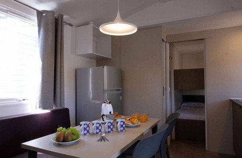 Mandrione House | Mobilehome with half-imagined wooden terrace