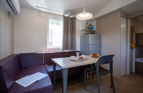 Mandrione House | Mobilehome with half-imagined wooden terrace