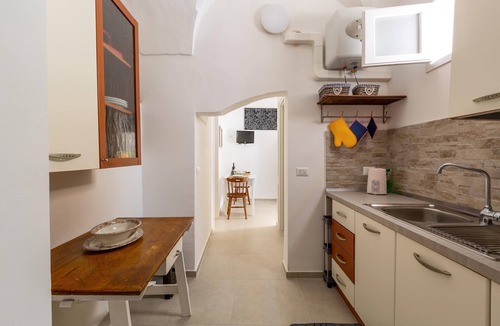 Tuglie House | Vico dei Mille by BarbarHouse