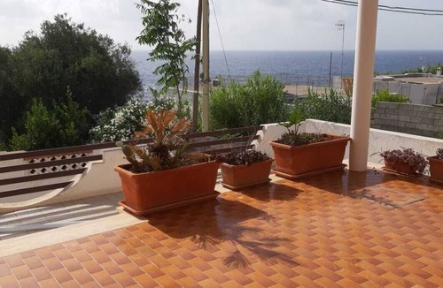 Porto Tricase Apartment | Villa Aliaksandra swimming pool and garden in Tricase Porto. In front of the sea