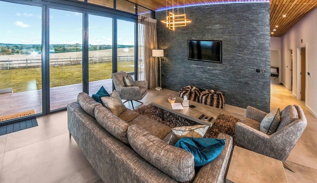 Three bed lodge with two king-size beds and one twin (king by arrangement).