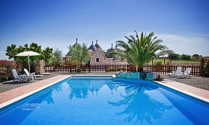 Martina Franca House | Il Ciliegeto: 1800s trullo house with views of pool, vineyard and Itria Valley
