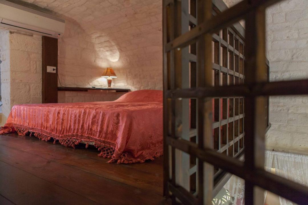Photo of Bedroom in The Trulli of Alberobello